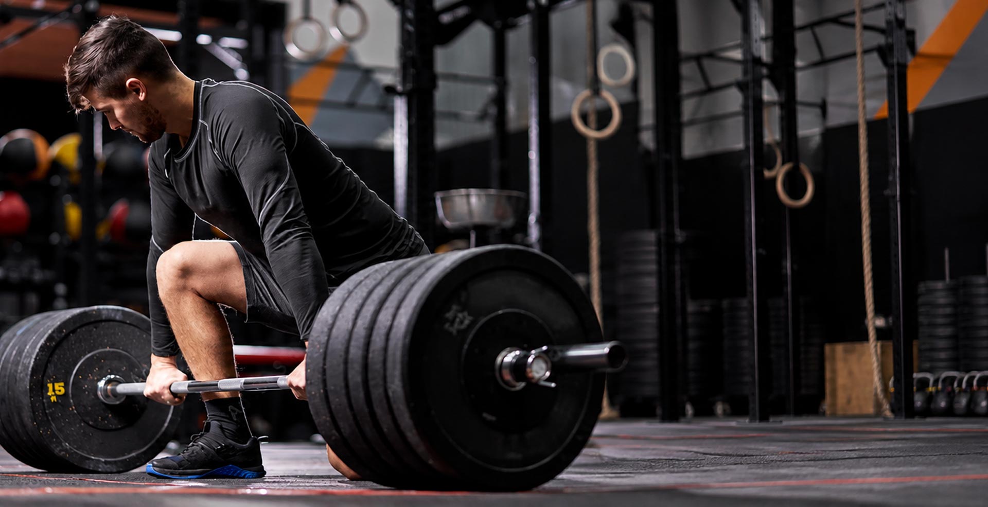 Man lifting weights at gym