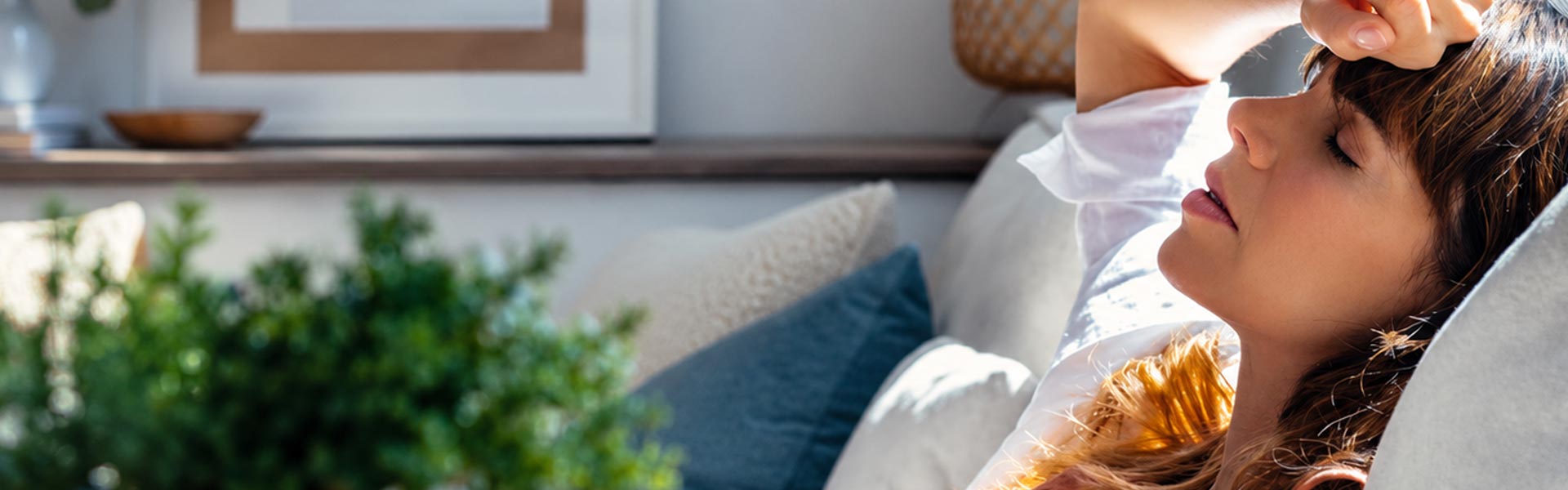 Woman sleeping on sofa